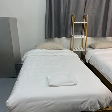 7 Beds Including 2 Double Beds, 3 Single Beds, 2 Sofa Beds Serviced Studio, Suite 8